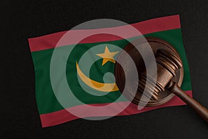 Judges hammer and the flag of Mauritania. Law and Justice. Constitutional law