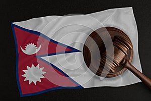 Judges hammer and the flag of Nepal. Law and Justice. Constitutional law