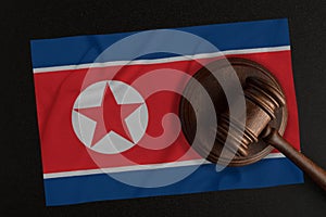 Judges hammer and the flag of North Korea. Law and Justice. Constitutional law