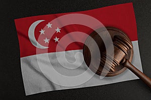 Judges hammer and the flag of Singapore. Law and Justice. Constitutional law