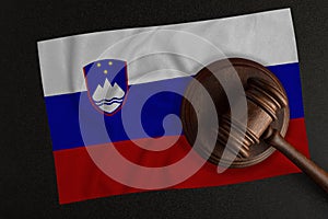 Judges hammer and the flag of Slovenia. Law and Justice. Constitutional law