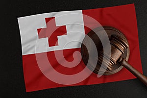 Judges hammer and the flag of Tonga. Law and Justice. Constitutional law