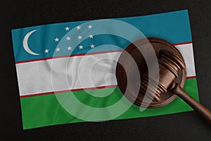 Judges hammer and the flag of Uzbekistan. Law and Justice. Constitutional law