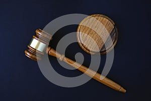 Judges wooden gavel on black background, justice concept