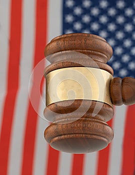 Judgment Gavel with the flag of the United States of America illustrating justice