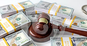 Judicial gavel on dollar money and financial crimes