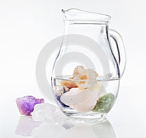 Jug of drinking water with healing stones