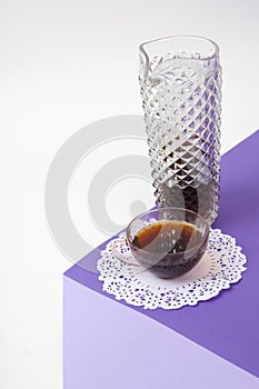 jug fake crystal and cup of coffee 3D illusion