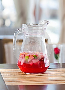 Jug of fresh red fruit drink