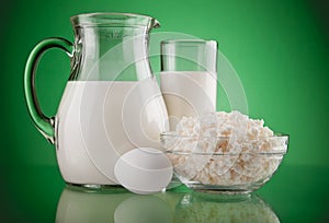 Jug and glass with milk and curds