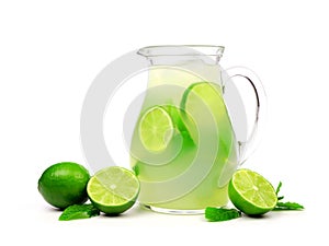 Jug of summer limeade isolated on white