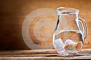 Jug of water with stones