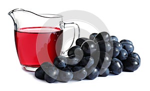 Jug with wine vinegar and fresh grapes