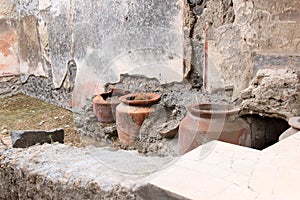 Jugs in Casa del frutteto in Roman Pompeii, Italy