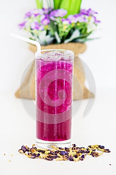 Juice of Butterfly pea with lemon and ice in glass