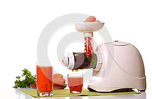 Juice extractor and carrot photo