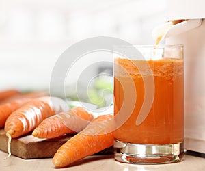 Juice extractor and carrot juice photo