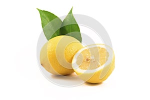 Juice lemons with green leaves