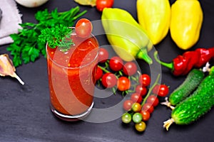 Juice from a red tomato in a glass