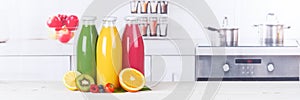Juice smoothie orange smoothies in kitchen copyspace banner bottle fruit fruits