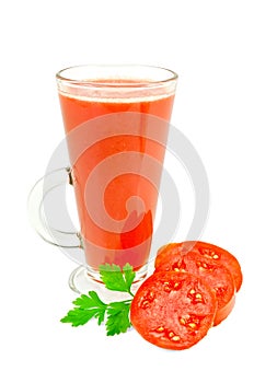Juice tomato in a tall glass with parsley
