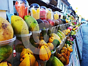 Juice tropical fruit mango papaya pineapple zumo de frutas photo