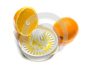 Juicer with oranges white background