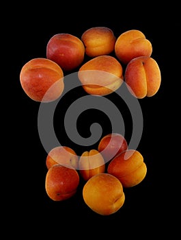 Juicy apricot on white background close-up. Fruit, food, harvest, vitamins, snack, wallpaper