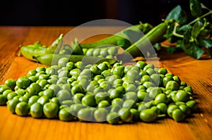 Juicy beans. ripe green peas on wooden boards