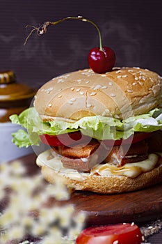 Juicy CHICKEN SAUSAGE BURGER MEAL, hamburger or cheeseburger with one chicken patties, with sauce, french fries and cold drink..