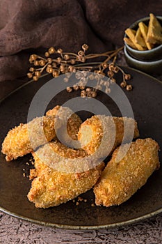 Juicy, crispy chicken wings breaded.