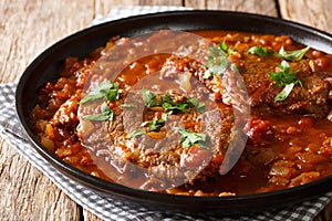 Juicy cube Swiss steak fried and slowly stewed in a spicy tomato