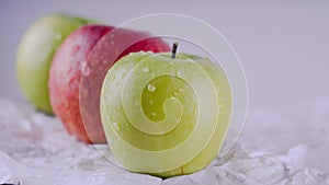 Juicy and delicious Apple lying on the table, fruit on the table. Apples on white background. The concept of healthy eating.