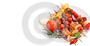 Juicy delicious BBQ Grilled with pork ,sausage,tomato,onion,pineapple,chilli Skewers in plate on isolated white background