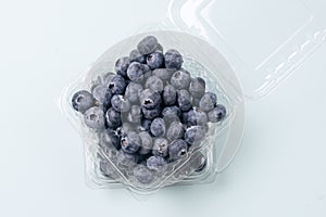 Juicy and fresh blueberries on Light Green Background Concept for healthy eating and nutrition