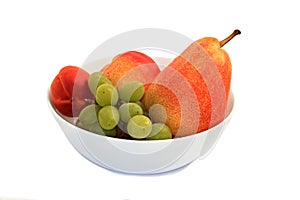 juicy fresh pears apricots and grapes on a white background photo