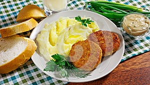 Juicy fried meat cutlets with mashed potatoes