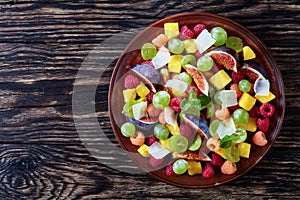 Juicy fruit salad with figs, flatlay