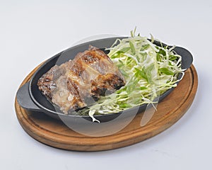 Juicy grilled barbecue steak served over white background. Delicious bbq meat concept