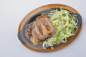 Juicy grilled barbecue steak served over white background. Delicious bbq meat concept