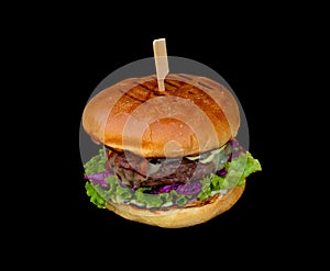 Juicy handmade hamburger isolated on black, party snacks