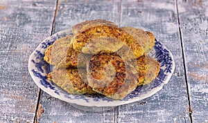 Juicy homemade fried meat and vegetable cutlets with herbs. Turkey, chicken, carrot,  onion, garlic, cubbage, eryngii mushroom,
