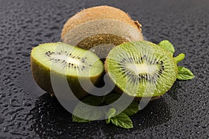 Juicy kiwi fruit and freas mint leaves
