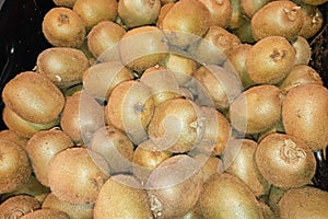 Juicy kiwi fruit on market for sale background