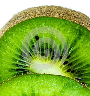 Juicy kiwi fruit sliced on white