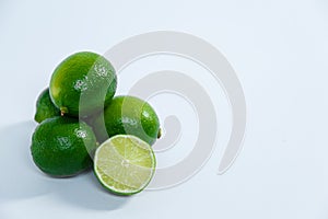 Juicy limes on a white background