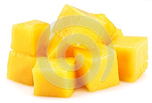 Juicy mango cubes isolated on white background