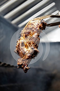 Juicy meat steaks and fillets are grilled