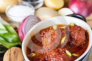 Juicy Meatballs with Tomato Sauce and Ingredients for Cooking