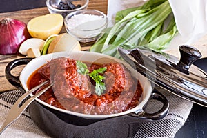 Juicy Meatballs with Tomato Sauce and Ingredients for Cooking